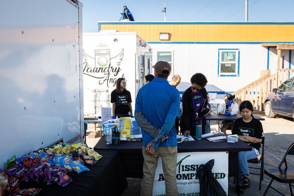 Mission Accomplished event setup with snacks and branding